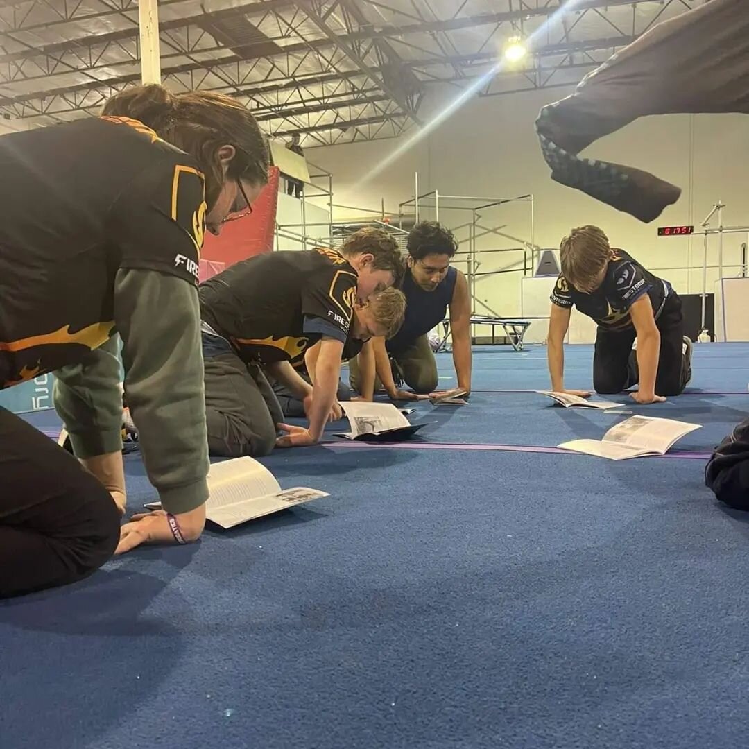 The competition team and coaches at @firestormgalaxy reading Once Is Never 🔥 Thank you @rememberme77 for these photos! 🙏❤️

.

#parkourlife #parkourcommunity #parkour #freerunning #wcpkc #printdesign