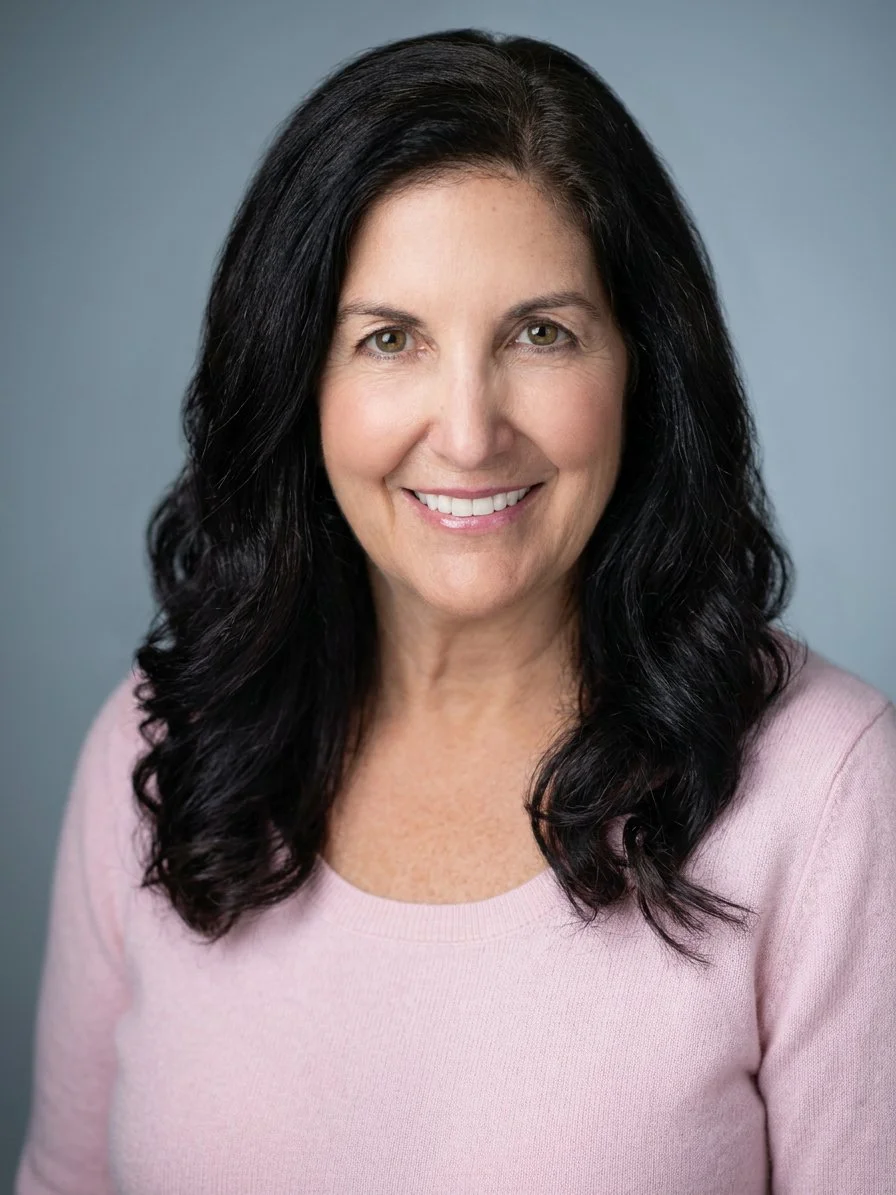 Lisa Cedrone in a pink sweater.