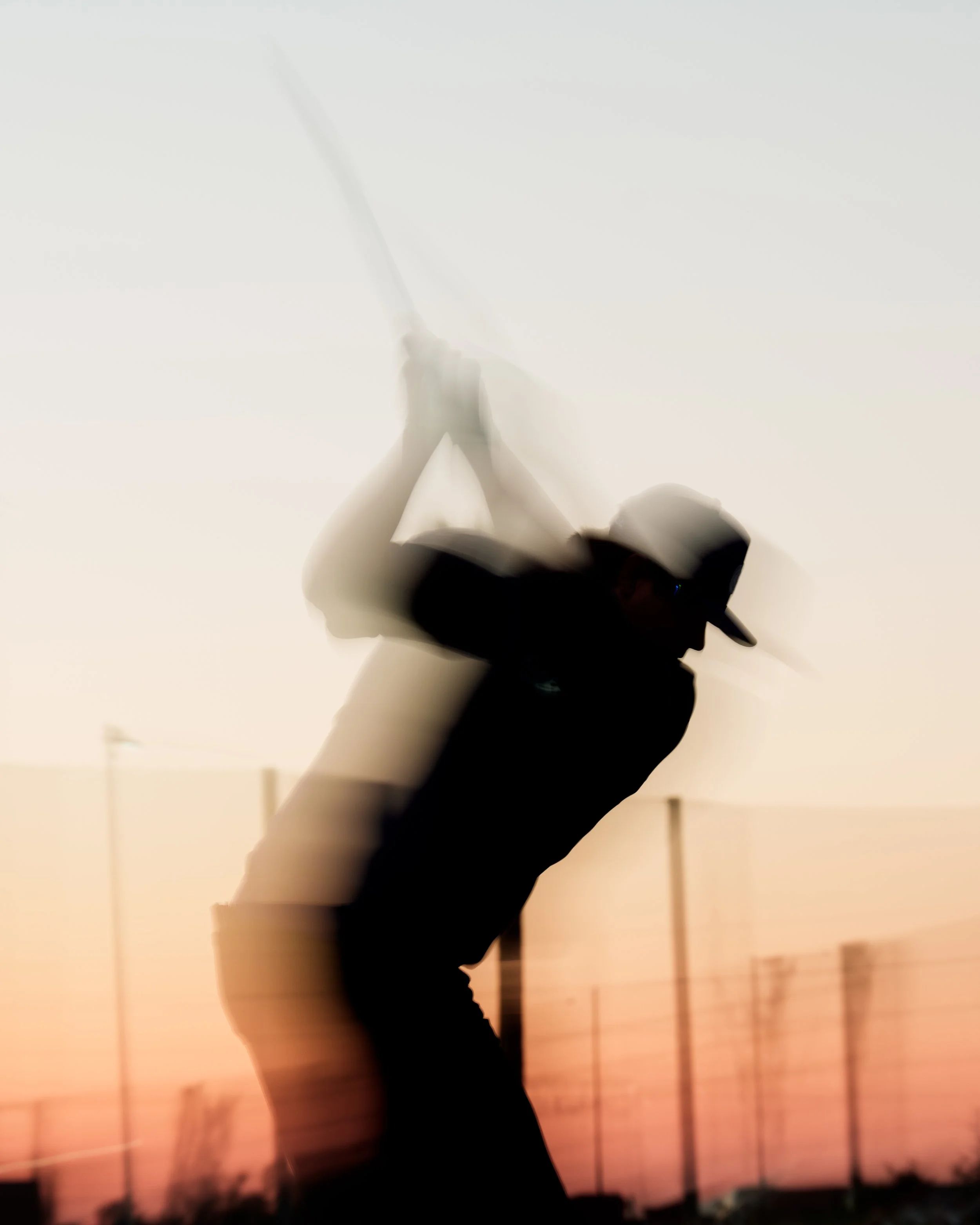 Ryan MacPherson of the Michigan Auto Aces tees off during sunset at the Grass League Championship in Tempe, Arizona - December 2025