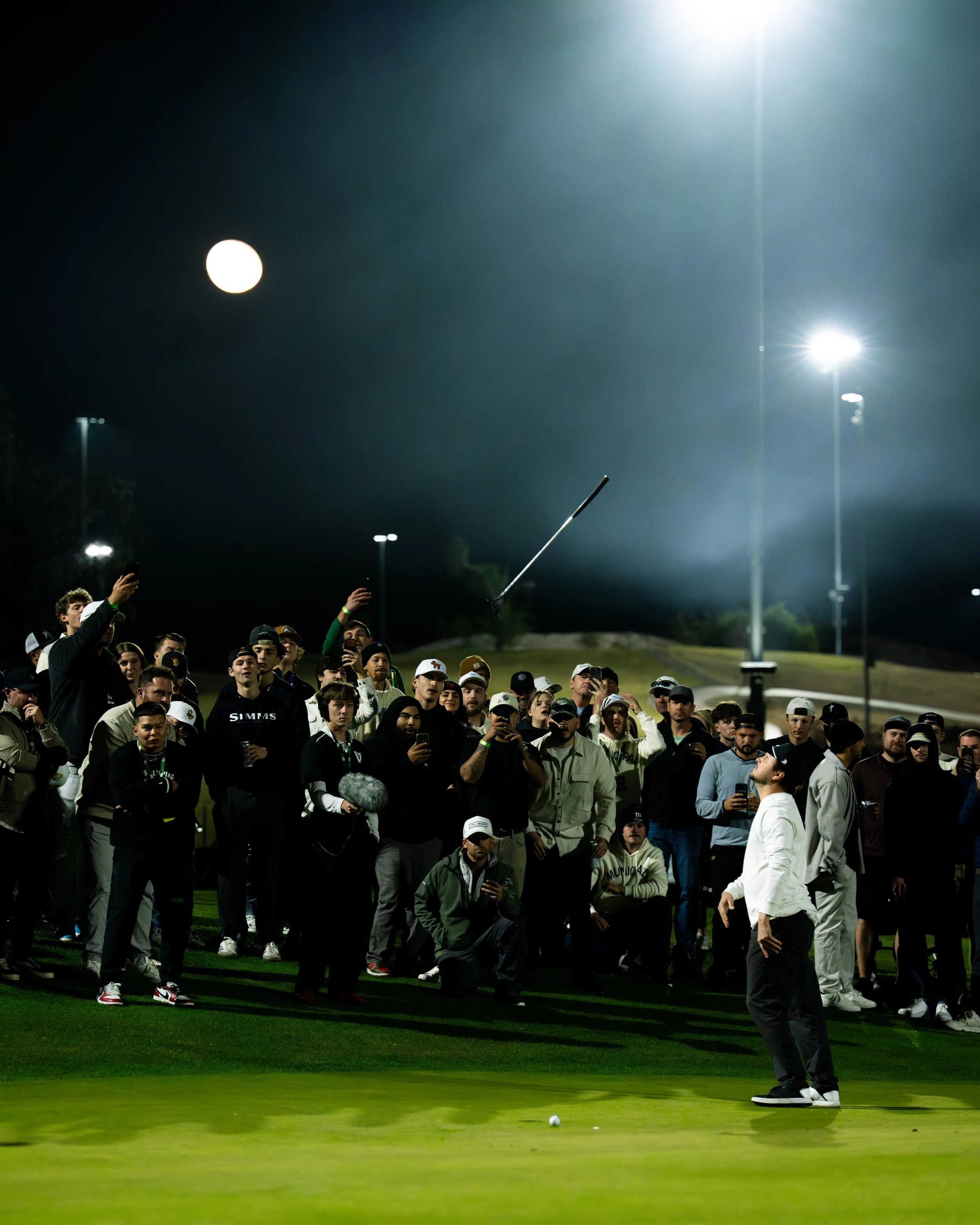 Play for the San Diego Munis tosses his putter after a crucial missed putt on the 18th hole during the 2025 Grass League Championship.