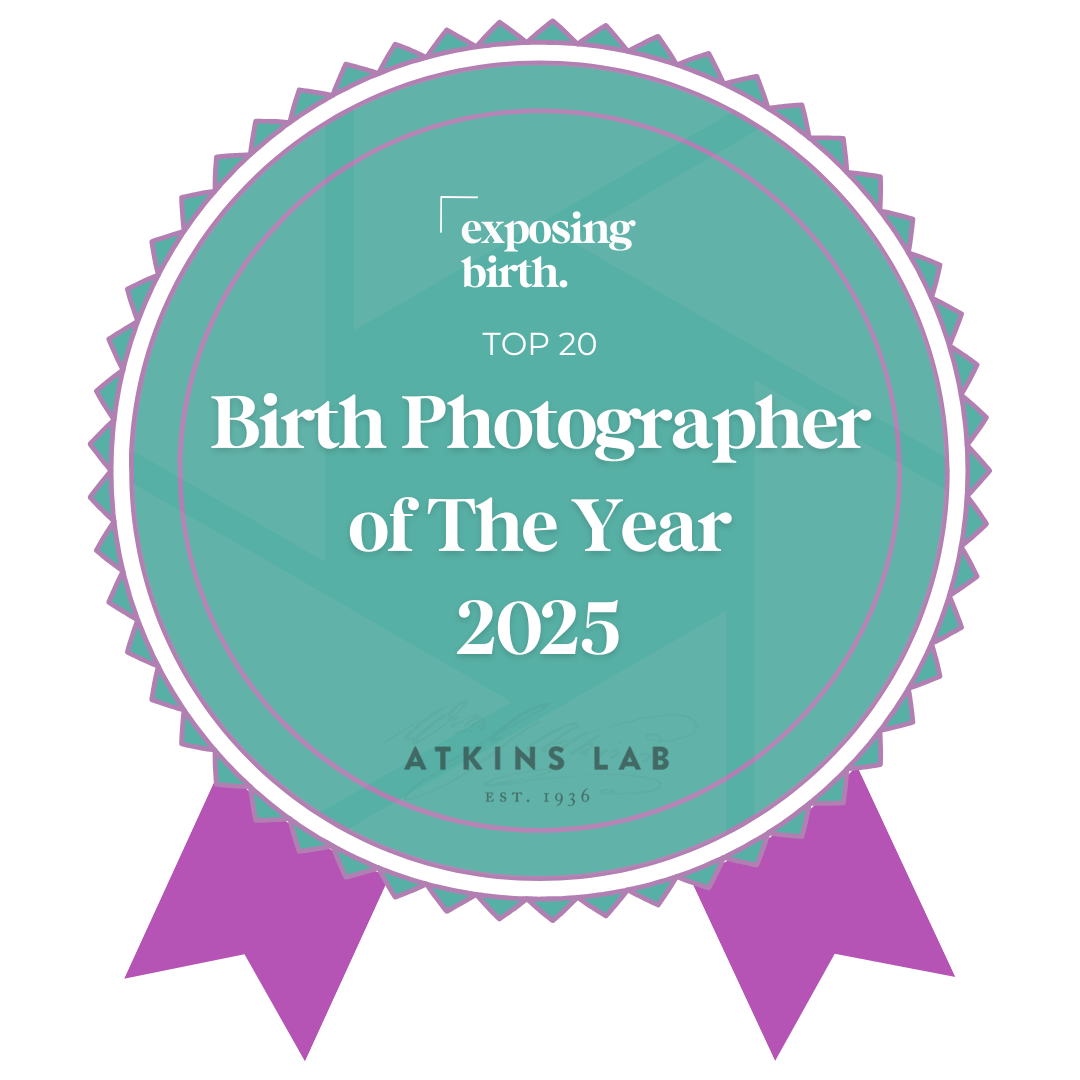 A badge with a purple and teal geometric background, stating 'exposing birth. TOP 20 Birth Photographer of The Year 2025' from ATKINS LAB established in 1936.