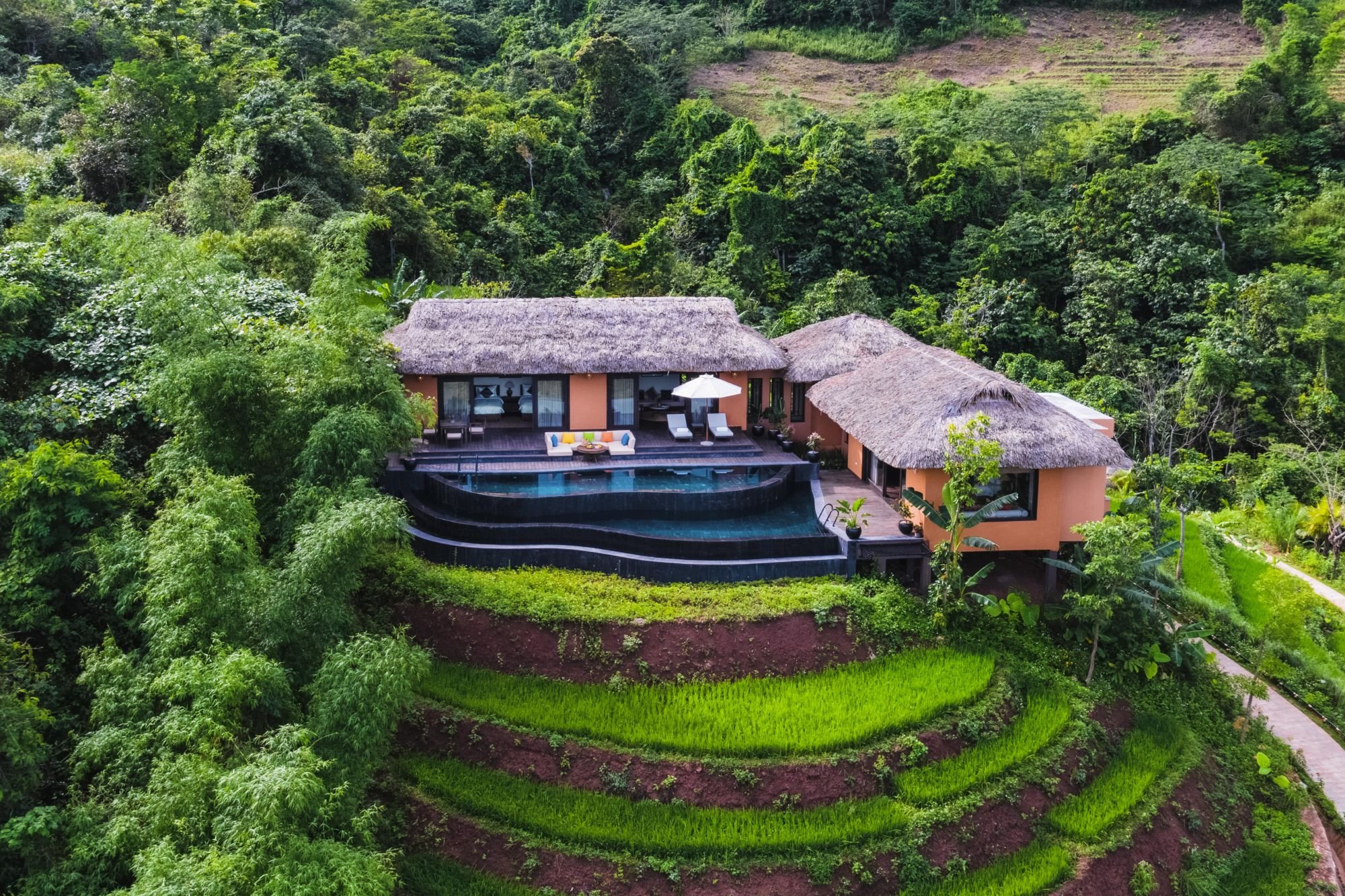 Asia Sustainable Travel_Avana Retreat_Senna Hilltop Pool Villa Drone.jpeg