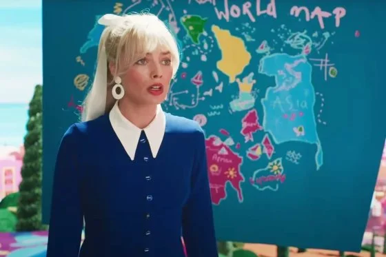 Margot Robbie as Barbie in a scene from "Barbie'' shows her standing next to a map that appears to depict China's nine-dash line in the South China Sea.