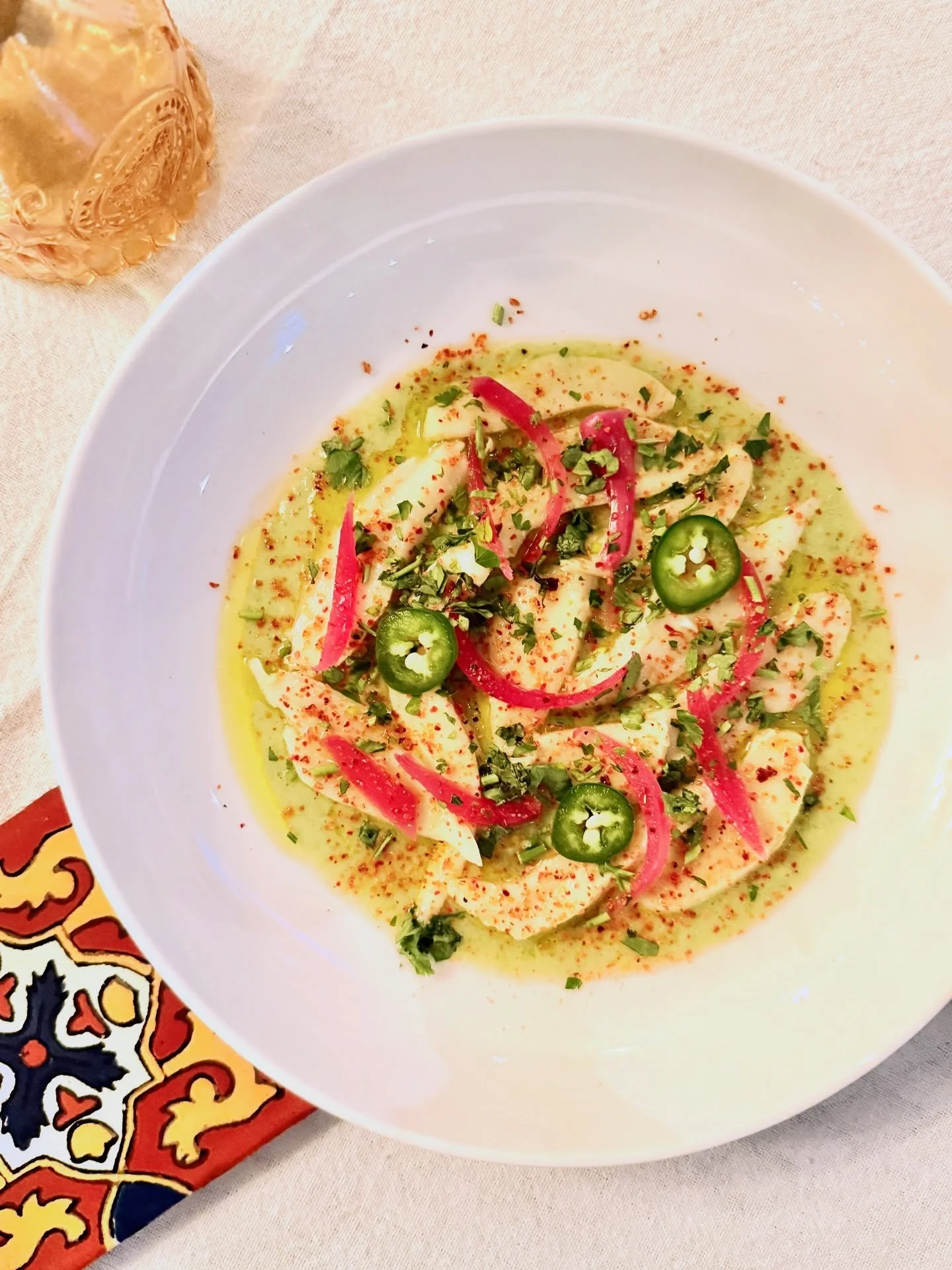 Sharp lime.
Fresh herbs.
Tender conch.
Baja meets the Caribbean, one bite at a time with our aguachile de lambi.

#SGM26 #HaitiBites #AguachileDeLambi #BajaFlavors #TijuanaXayiti