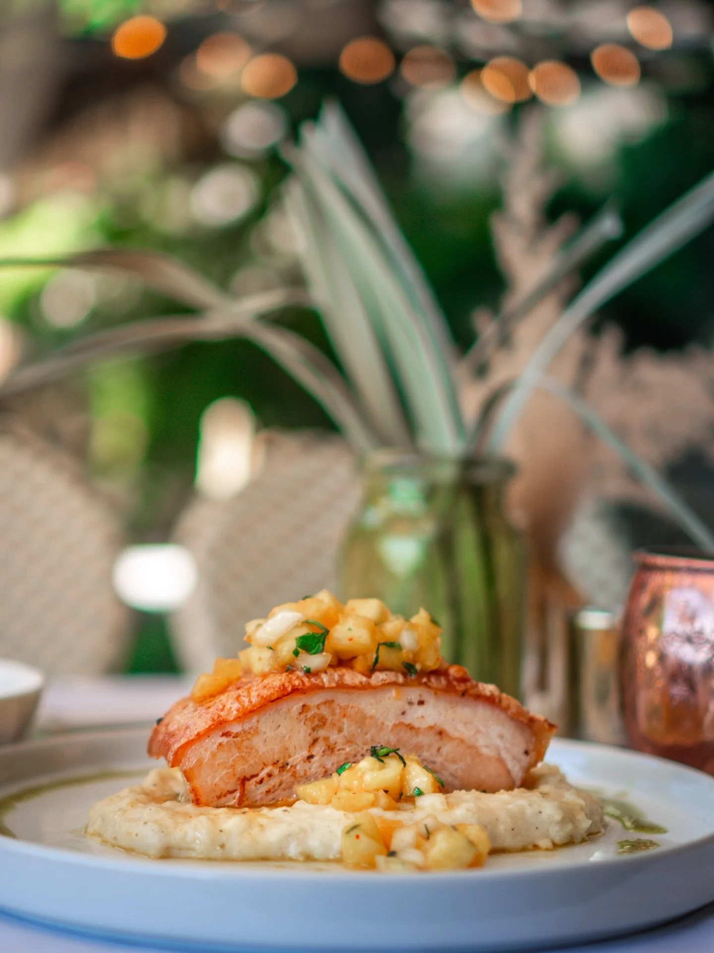 Crispy. Tender. Bright.

Slow-cooked juicy pork belly, finished until golden and crispy, set over a smooth pur&eacute;e of manioc and lifted with fresh pineapple, cilantro, and citrus.

Richness, cut with freshness 🩵 exactly how we like it.

From Ti