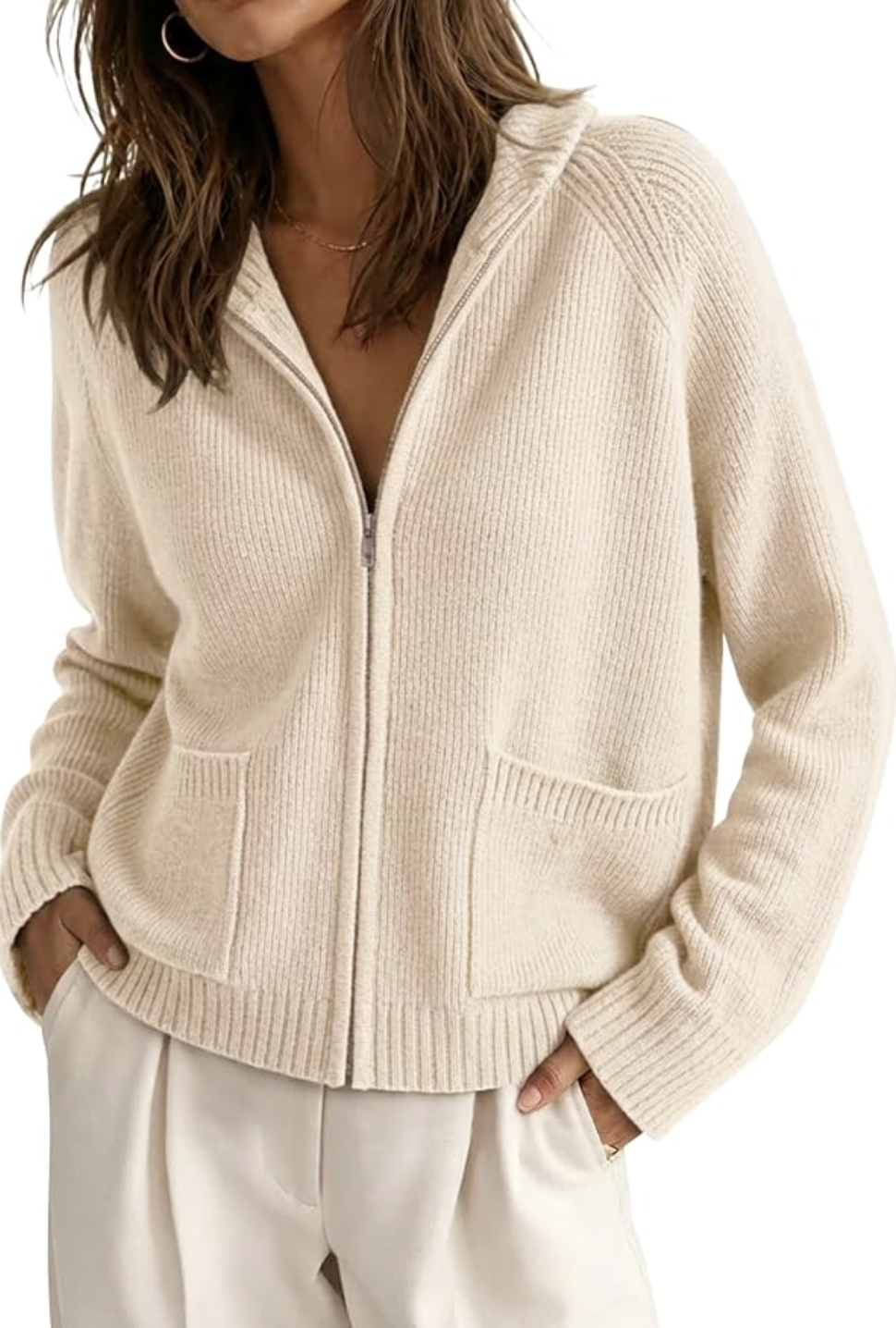 Cream ribbed knit cardigan jacket with zipper closure.