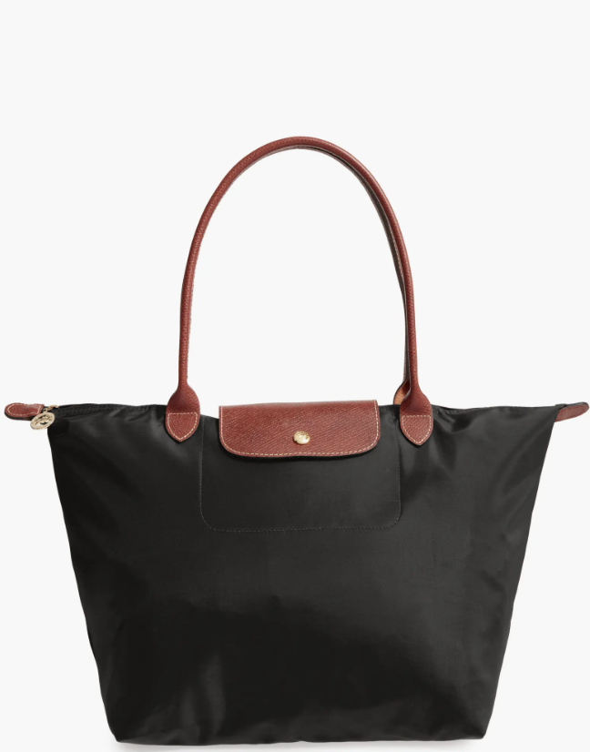 Black nylon Longchamp Le Pliage Original Large Tote with brown leather trim, gold-tone hardware, and a signature top-handle design.