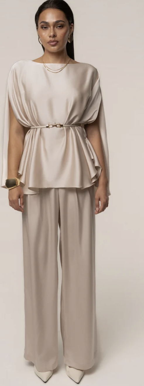 Woman wearing a JLuxeLabel champagne satin power and poise pant set with wide-leg trousers and matching pointed-toe pumps