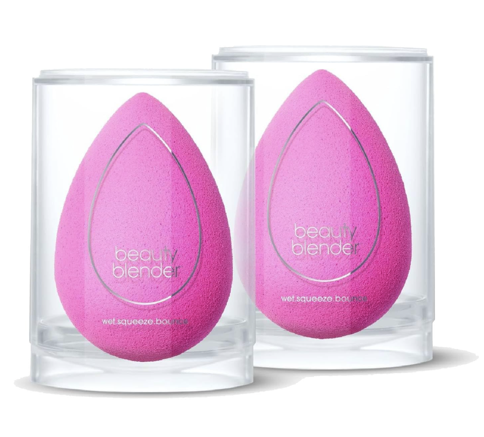 Original pink Beautyblender makeup sponge dampened for base application.