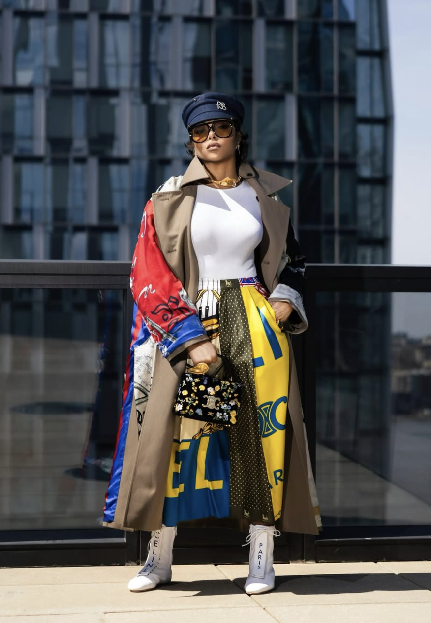 Taraji P. Henson wearing a high-contrast, multi-colored editorial look featuring a tan trench coat