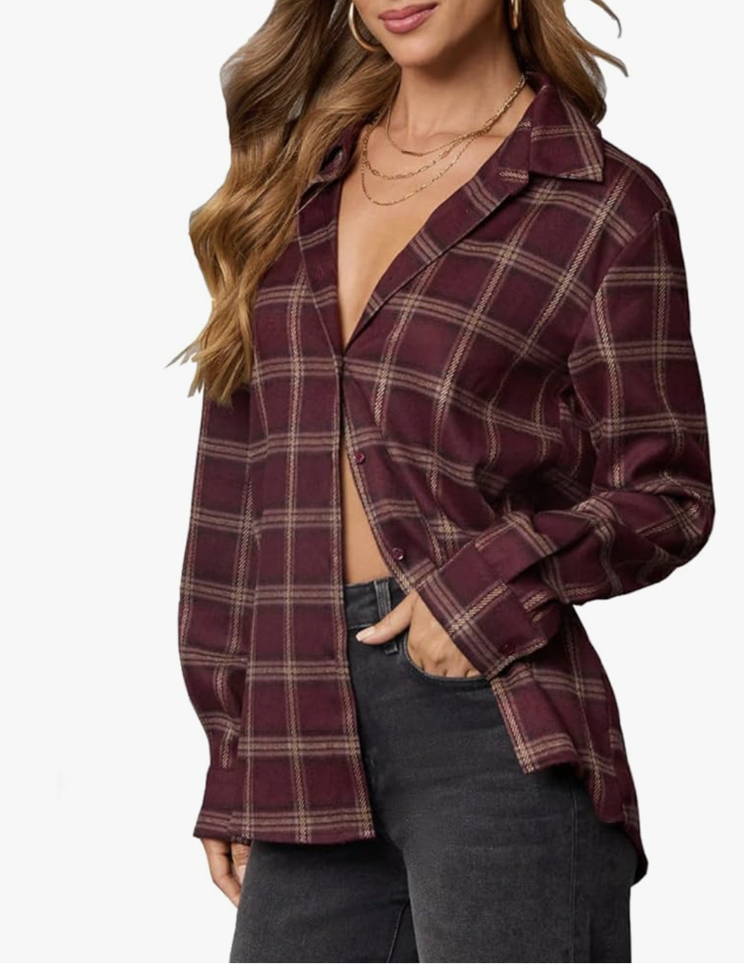 Product shot of a maroon and navy plaid flannel shirt worn open over a base layer, featured as a cozy seasonal layering piece for styling baggy jeans.