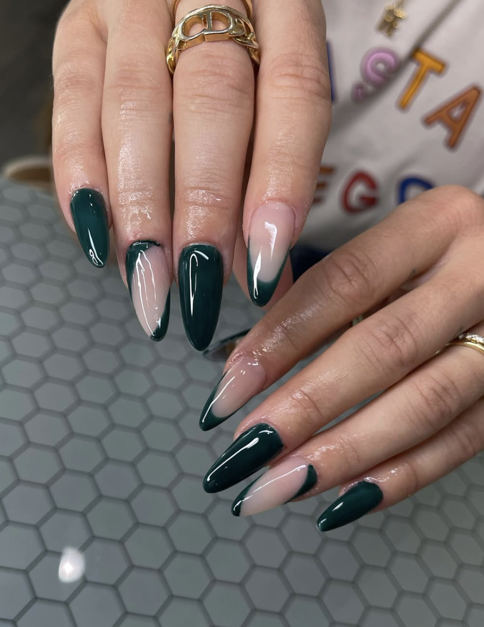 September nail idea featuring forest-green almond nails