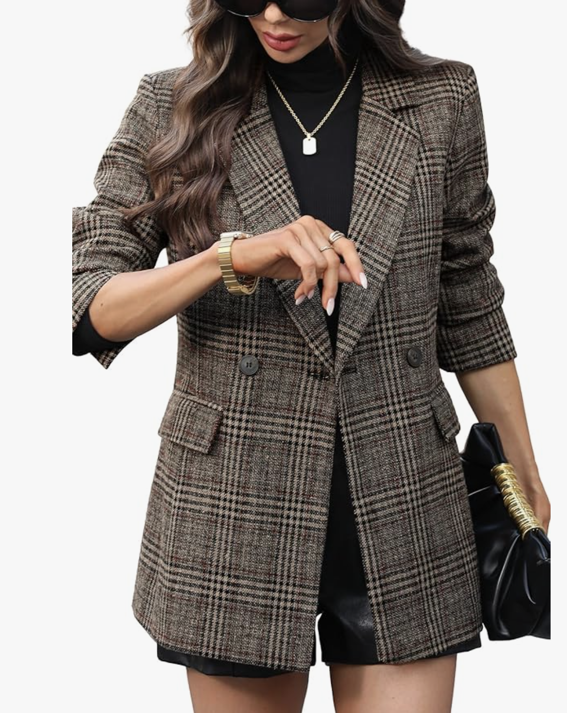 A woman wearing a fitted black ribbed turt