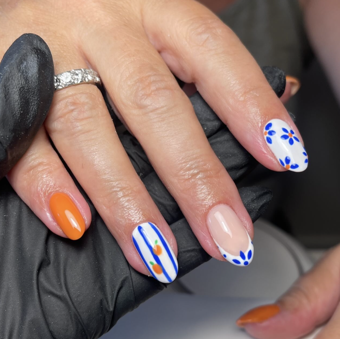 Blue-and-white pumpkin nail art inspired by hand-painted porcelain