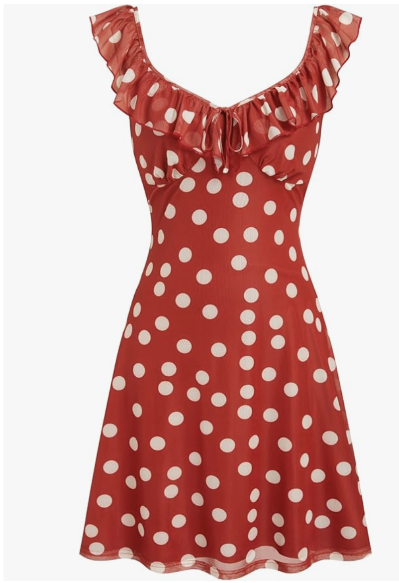 Fashion editor wearing a red and white polka dot mini dress with ruffle sleeves and a v-neckline, demonstrating a playful 2026 date night outfit formula.