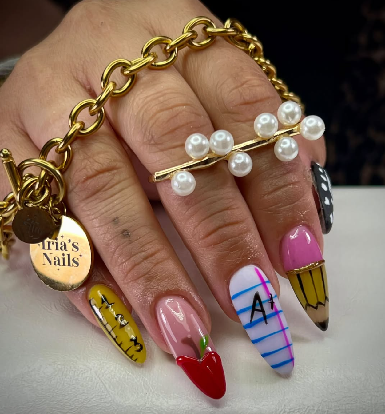 Cute notebook-line nail art for a back-to-school manicure