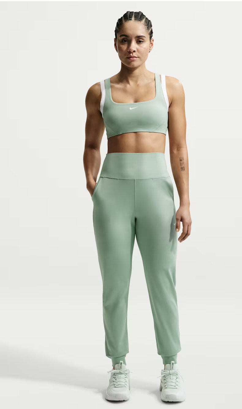 Sage green Nike Women's Dri-FIT Joggers with a matching sports bra