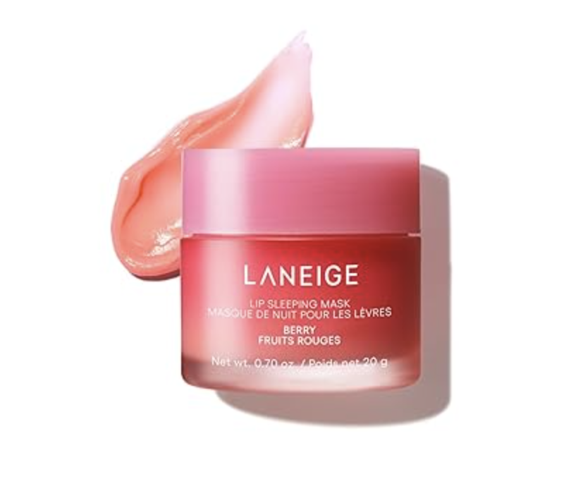 A close-up of a pink jar of LANEIGE Lip Sleeping Mask in Berry, featuring a smear of the glossy pink product next to it.