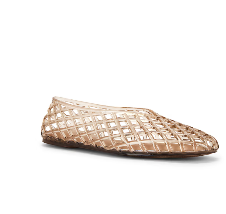 A close-up studio shot of a tan caged mesh ballet flat, showcasing a woven lattice design.