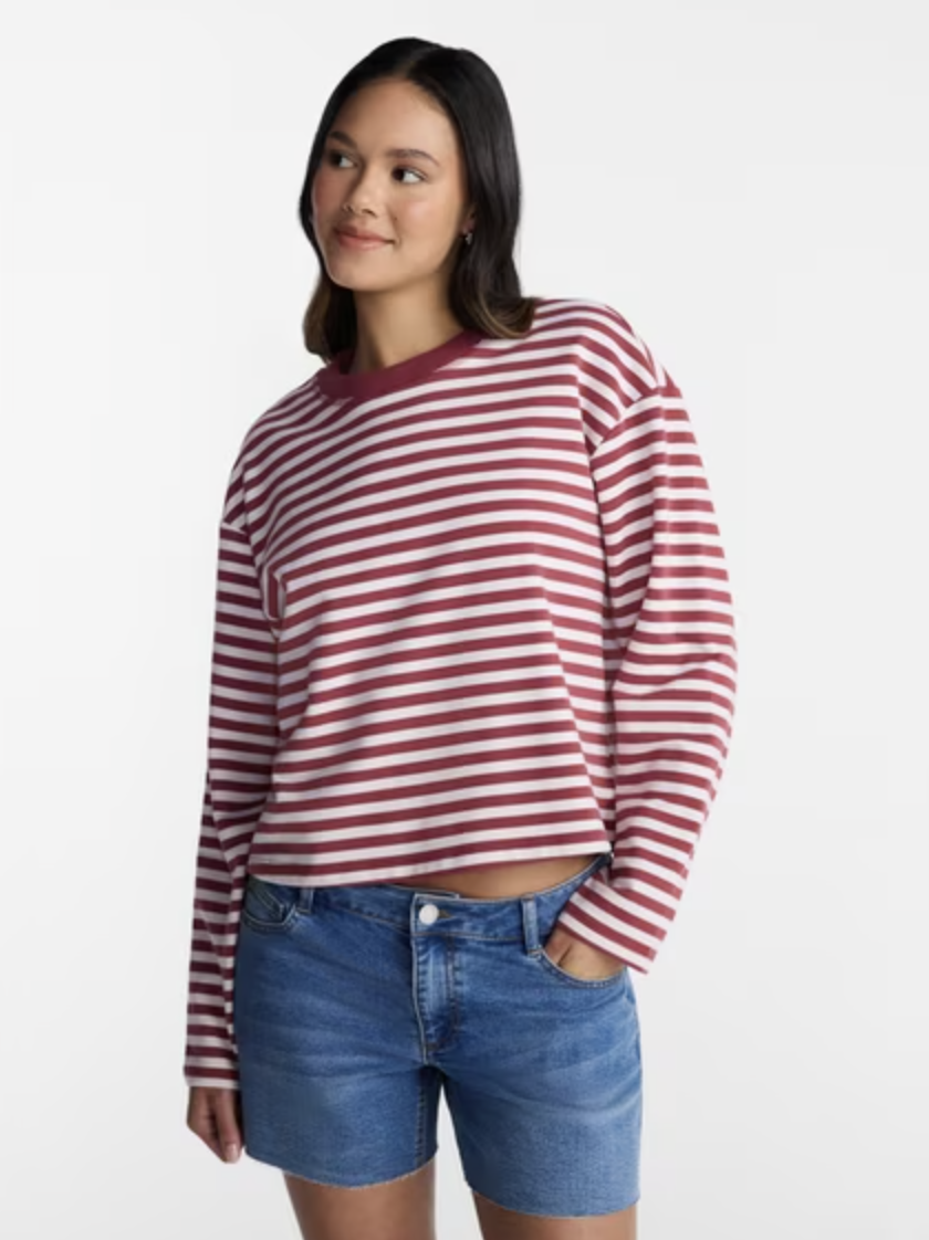 A classic black and white oversized long-sleeve striped t-shirt.