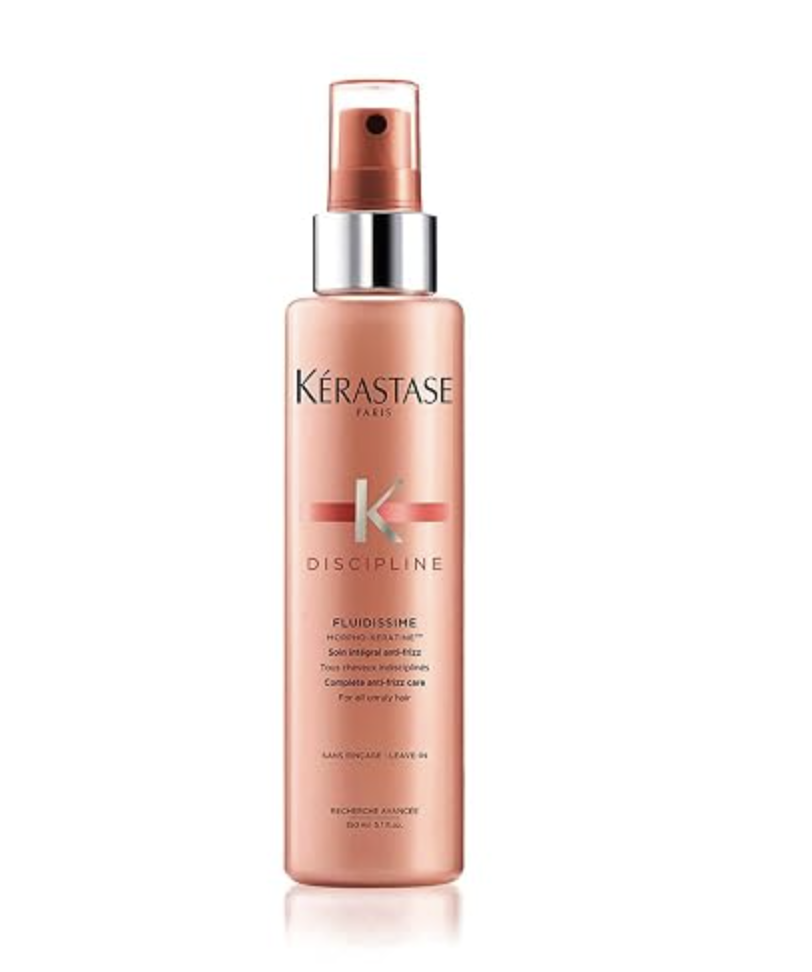 Bottle of Kérastase Discipline Fluidissime complete anti-frizz care leave-in spray.