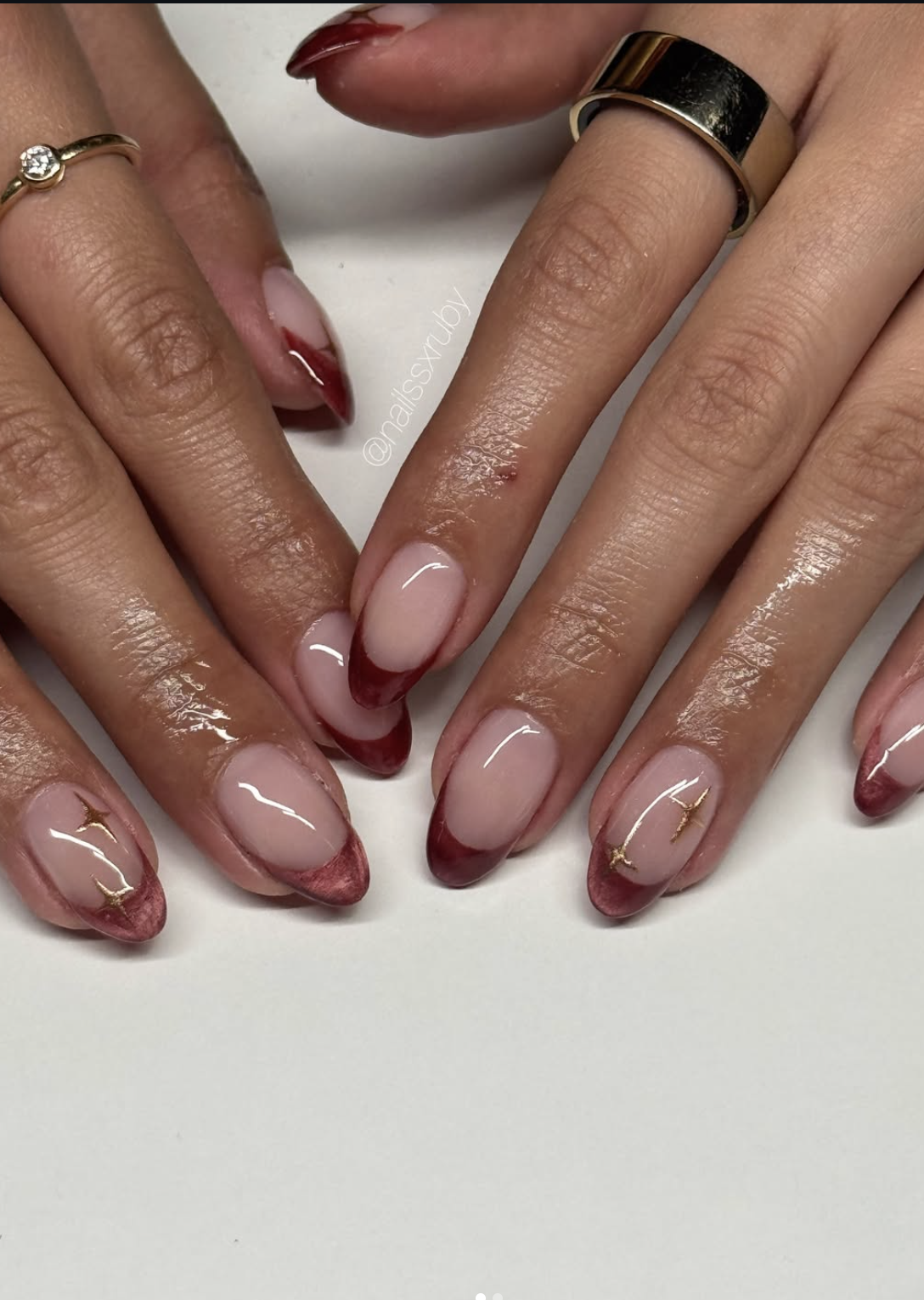 Sheer nude nails with cranberry French tips for Thanksgiving