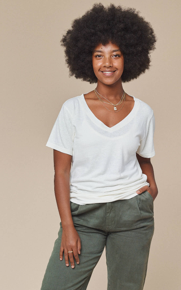 Woman wearing the Jungmaven Tiny T, a sustainable hemp and organic cotton white t-shirt with a textured slub finish.