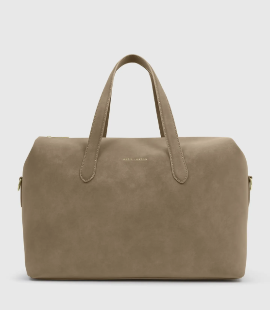 Taupe suedette cabin bag with a trapezoid shape and a luggage passthrough pocket.