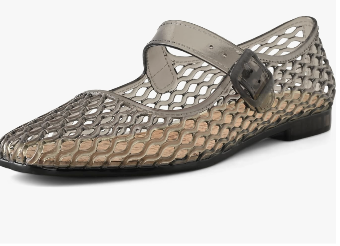 A close-up of a clear mesh jelly Mary Jane flat shoe, featuring a breathable cage design and a comfortable flat sole.