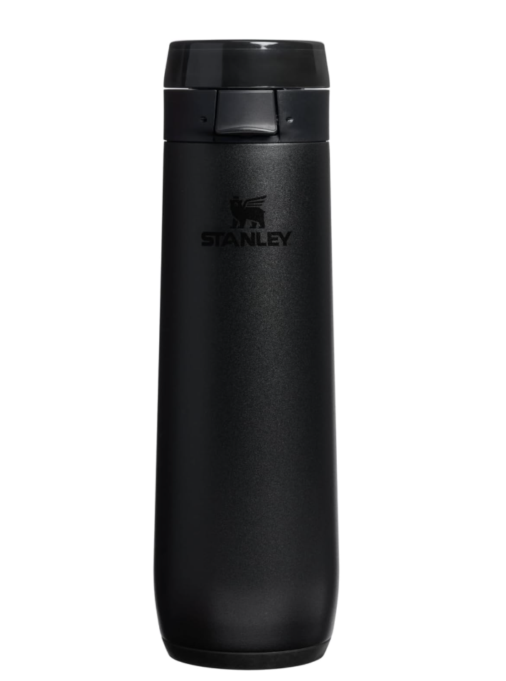 Empty reusable water bottle in an airport tote