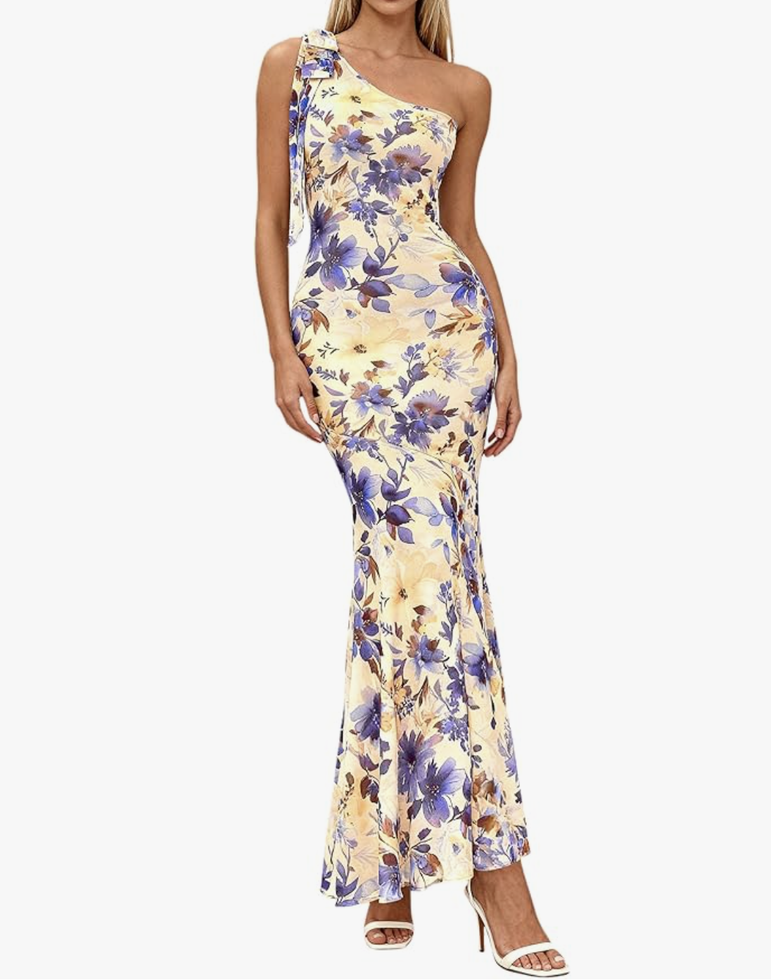 A woman wearing an asymmetrical one-shoulder maxi dress with a blue and apricot floral mesh overlay and a sculptural neckline.