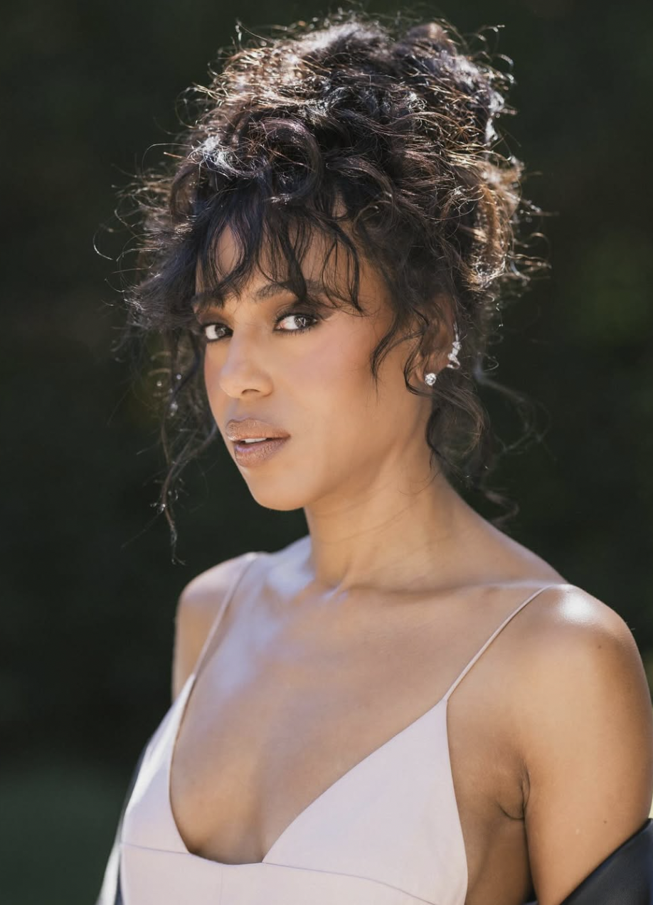 Kerry Washington wearing a soft, muted lavender-grey dress, demonstrating how cool-neutral undertones and soft chroma align with the Soft Summer season.