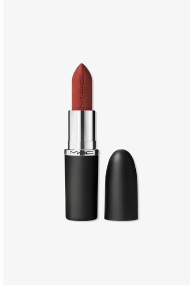 A close-up shot of a MAC Chili Matte Lipstick tube, showcasing the rich, warm brick-red shade with copper undertones that perfectly suits an Autumn color palette.