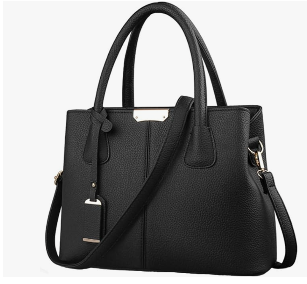 A structured black pebbled leather satchel tote with dual top handles, a decorative silver ring detail on the front, and a professional, spacious silhouette.