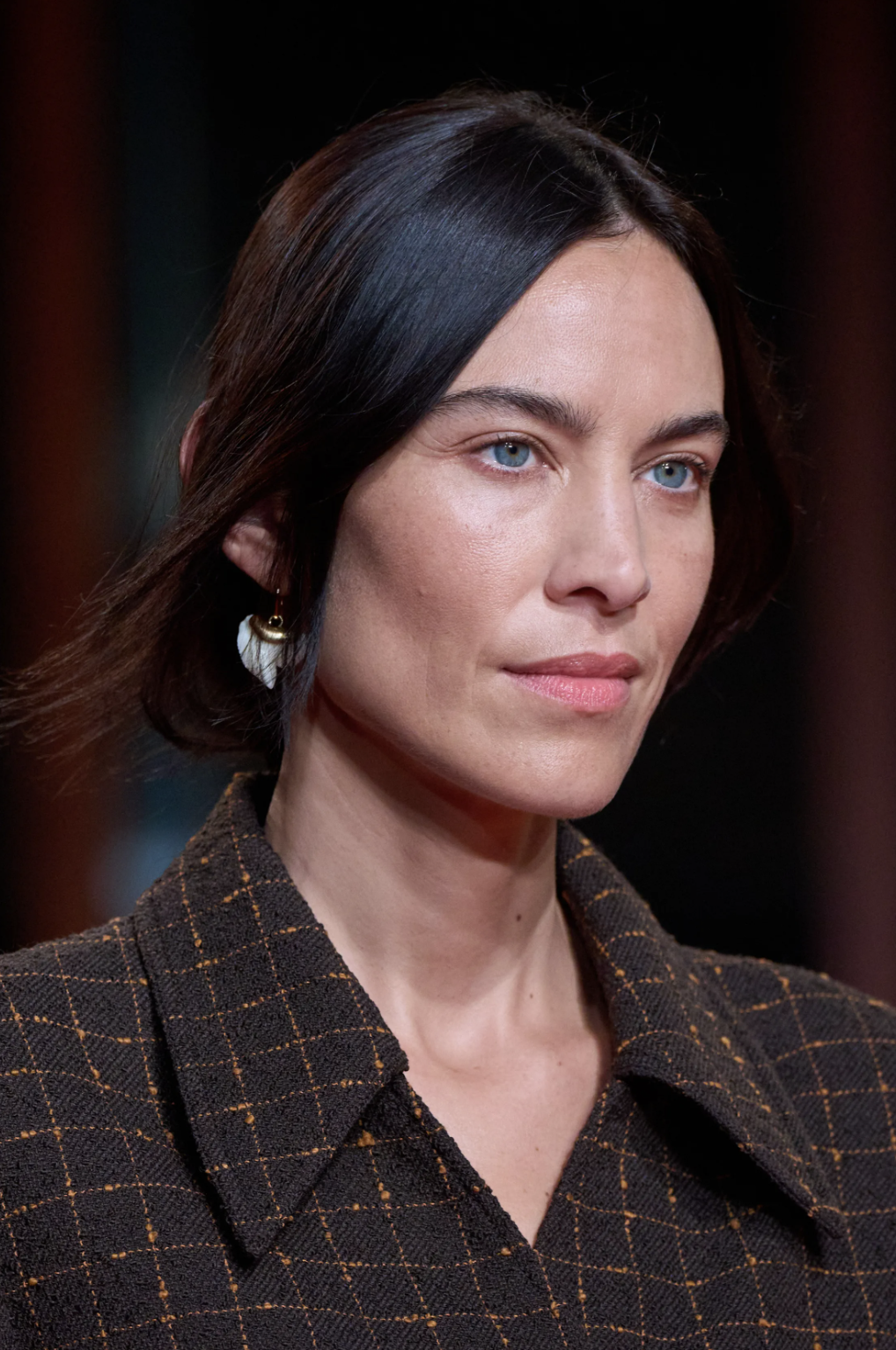 Shark-tooth earrings from Tory Burch’s spring 2027 collection.