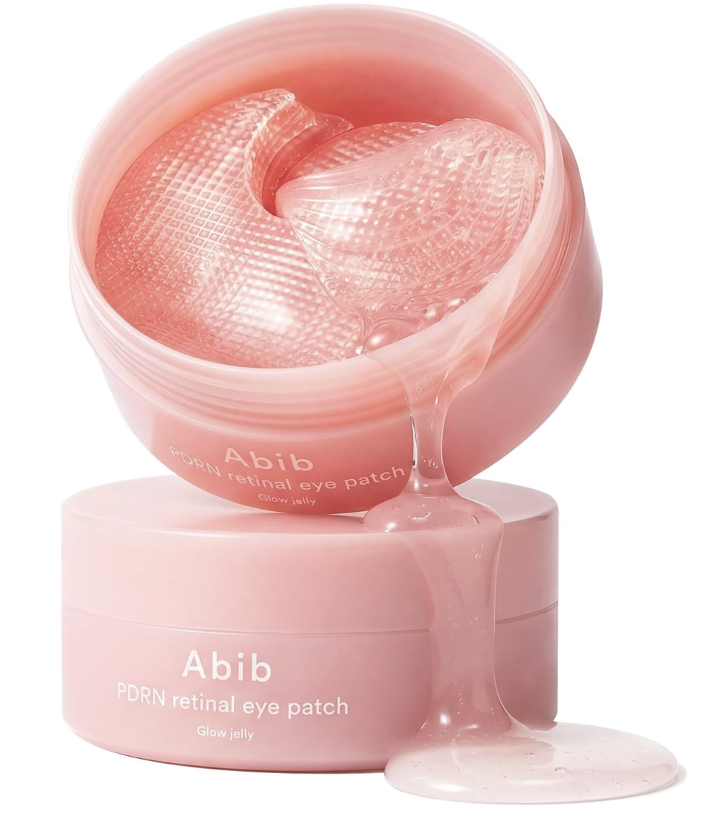 Two pink jars of Abib PDRN Retinal Eye Patches, one open to show the gel patches.