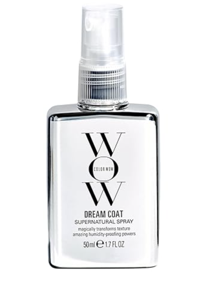 A front-facing view of a silver bottle of Color Wow Dream Coat Supernatural Spray anti-humidity treatment.