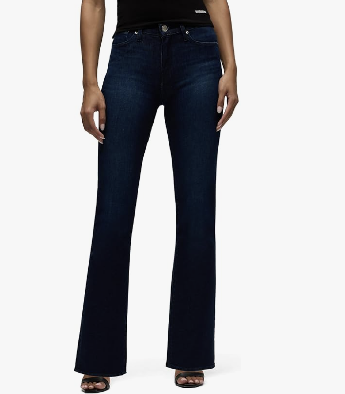 Front view of a woman wearing dark wash Hudson Barbara high-rise bootcut jeans that are fitted through the thigh with a subtle flare.