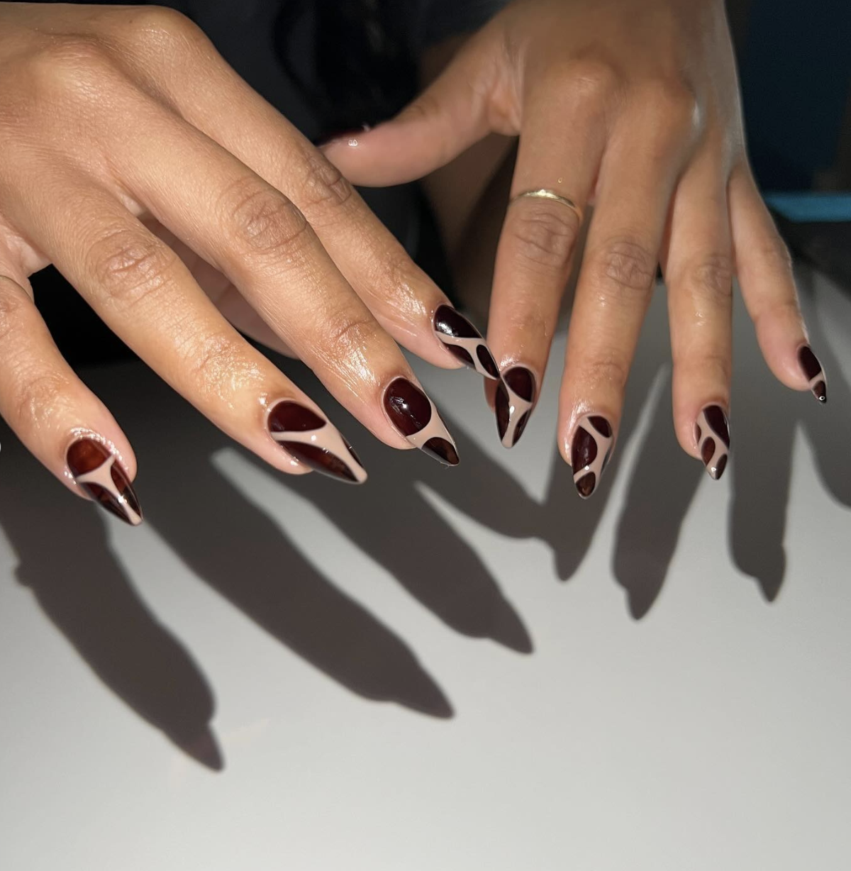 September nail idea featuring cocoa negative-space nails