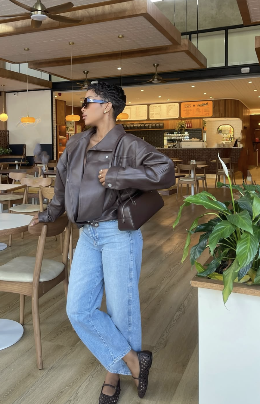 A satin blouse in rust styled for fall, featured in an Autum Love guide