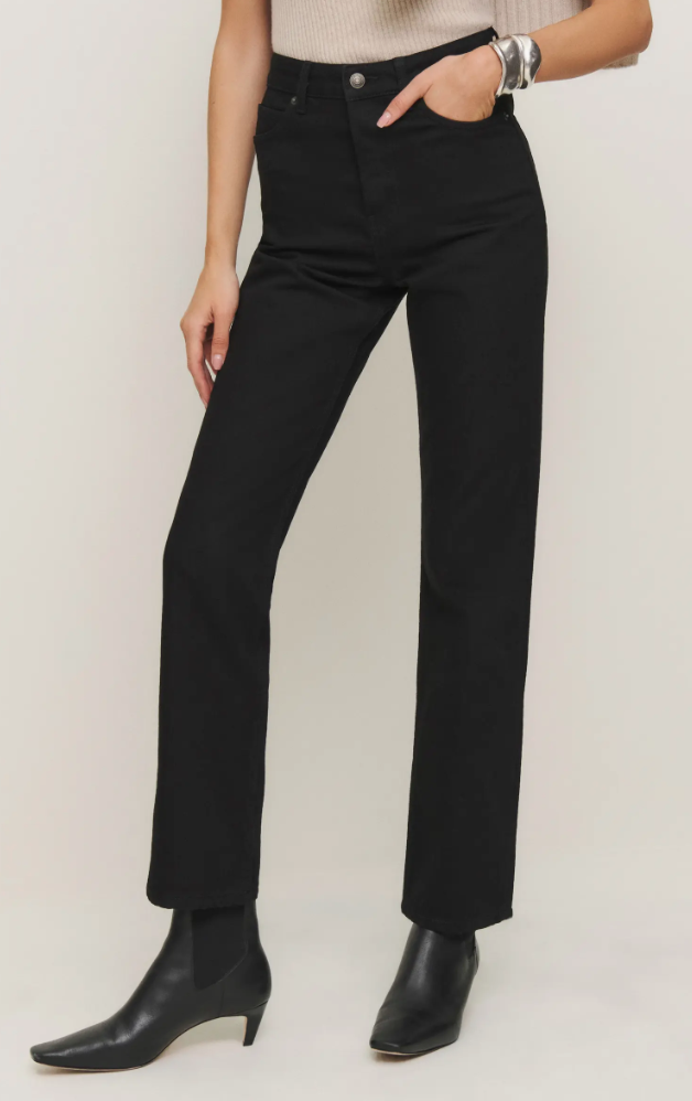 Reformation Cynthia High Waist Relaxed Jeans in a vintage light wash, showing the structured straight-leg fit designed for tall women.