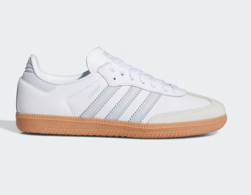Side profile of the Adidas Samba OG in white leather with a classic gum sole, highlighting its slim, low-profile silhouette.