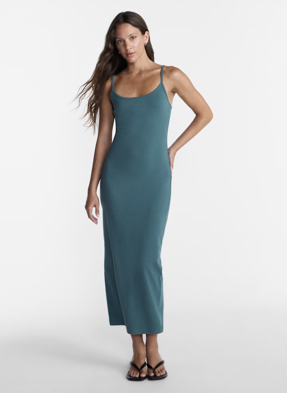 A sleek, minimal ribbed strappy maxi dress in a classic colorway.