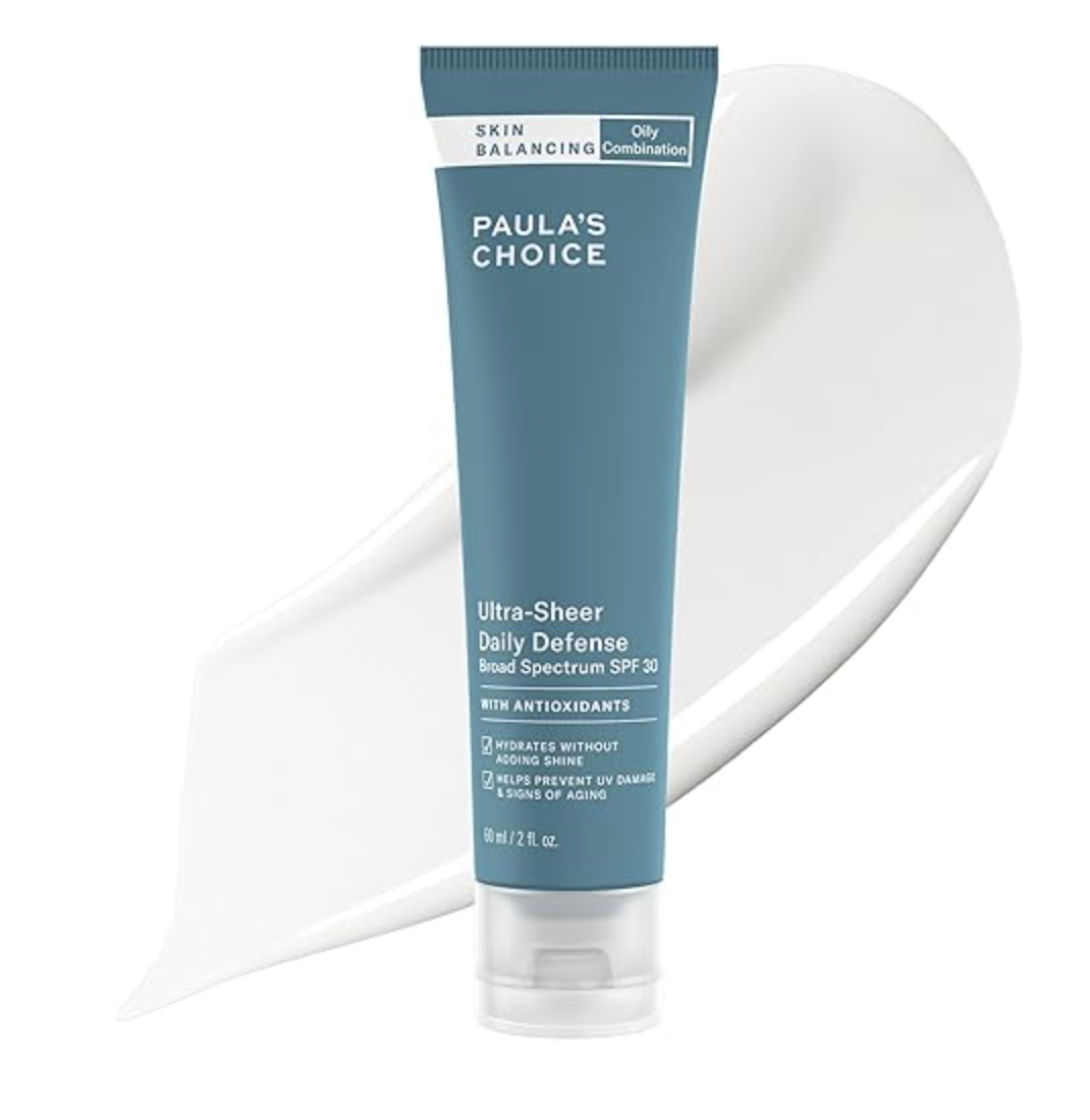 Product shot of Paula's Choice SKIN BALANCING Ultra-Sheer Daily Defense SPF 30 tube with a smudge of white sunscreen lotion next to it.