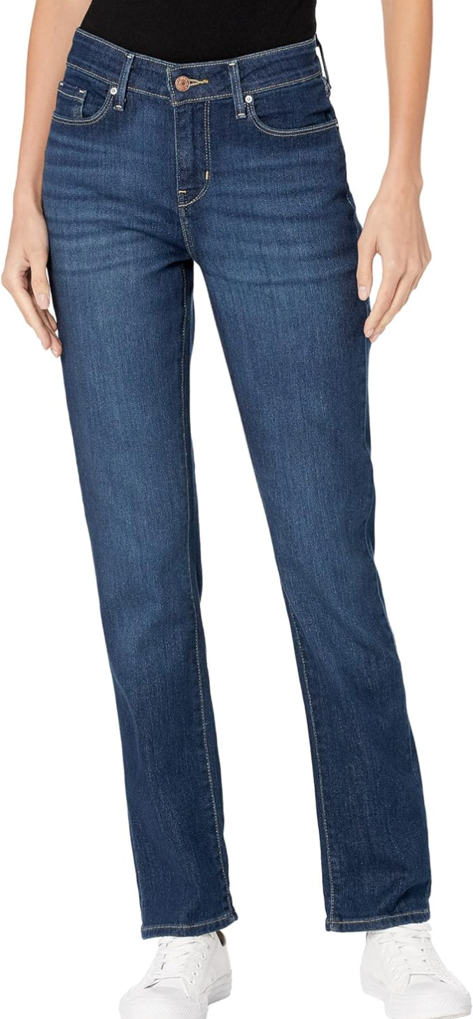 Signature by Levi’s Modern Straight jeans in a medium wash, styled with white sneakers to show the full-length fit on a tall frame.