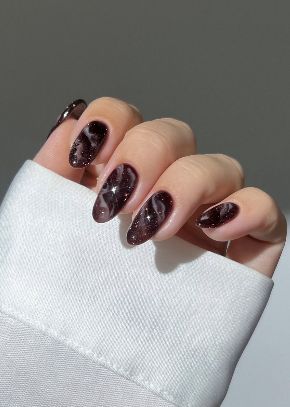 Mixed fall aura manicure in brown, burgundy, olive, rust and plum.