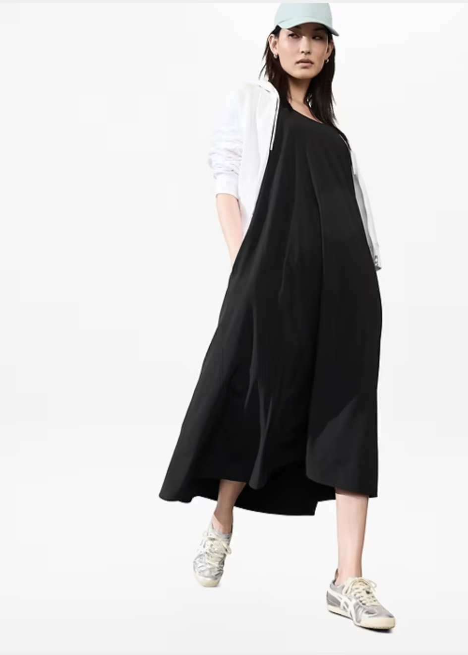 Professional traveler's pick: the Athleta Presidio Traveler Maxi dress in black, featuring a recycled polyester-spandex tech fabric with UPF 50+ protection, perfect for a wrinkle-free market day outfit.