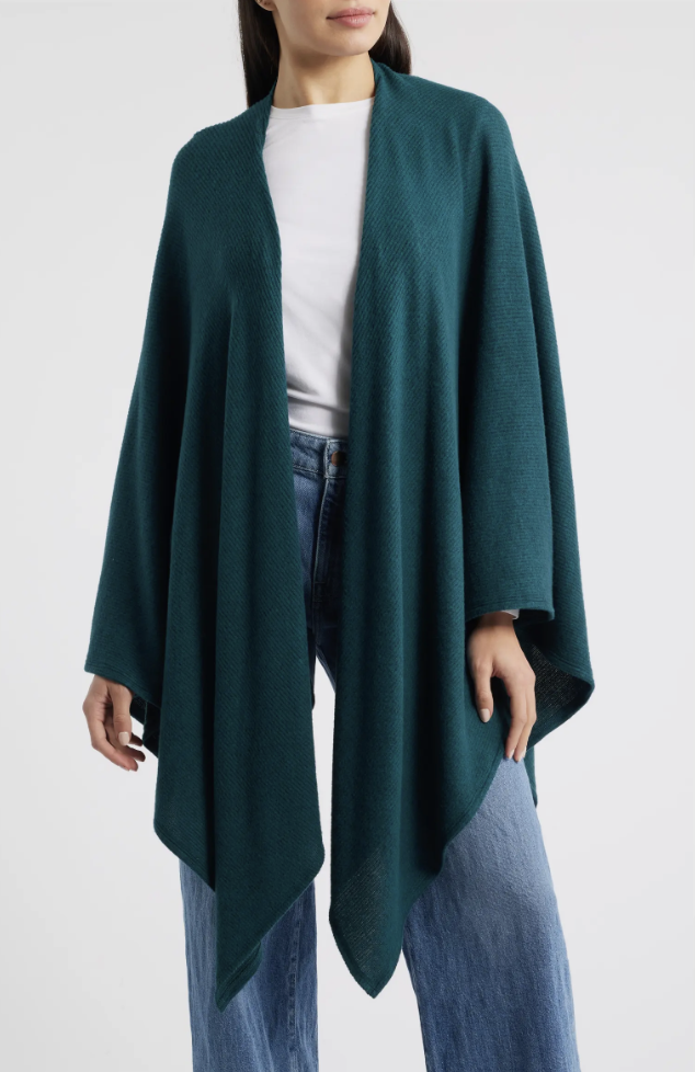 Soft oversized wrap folded inside a carry-on tote