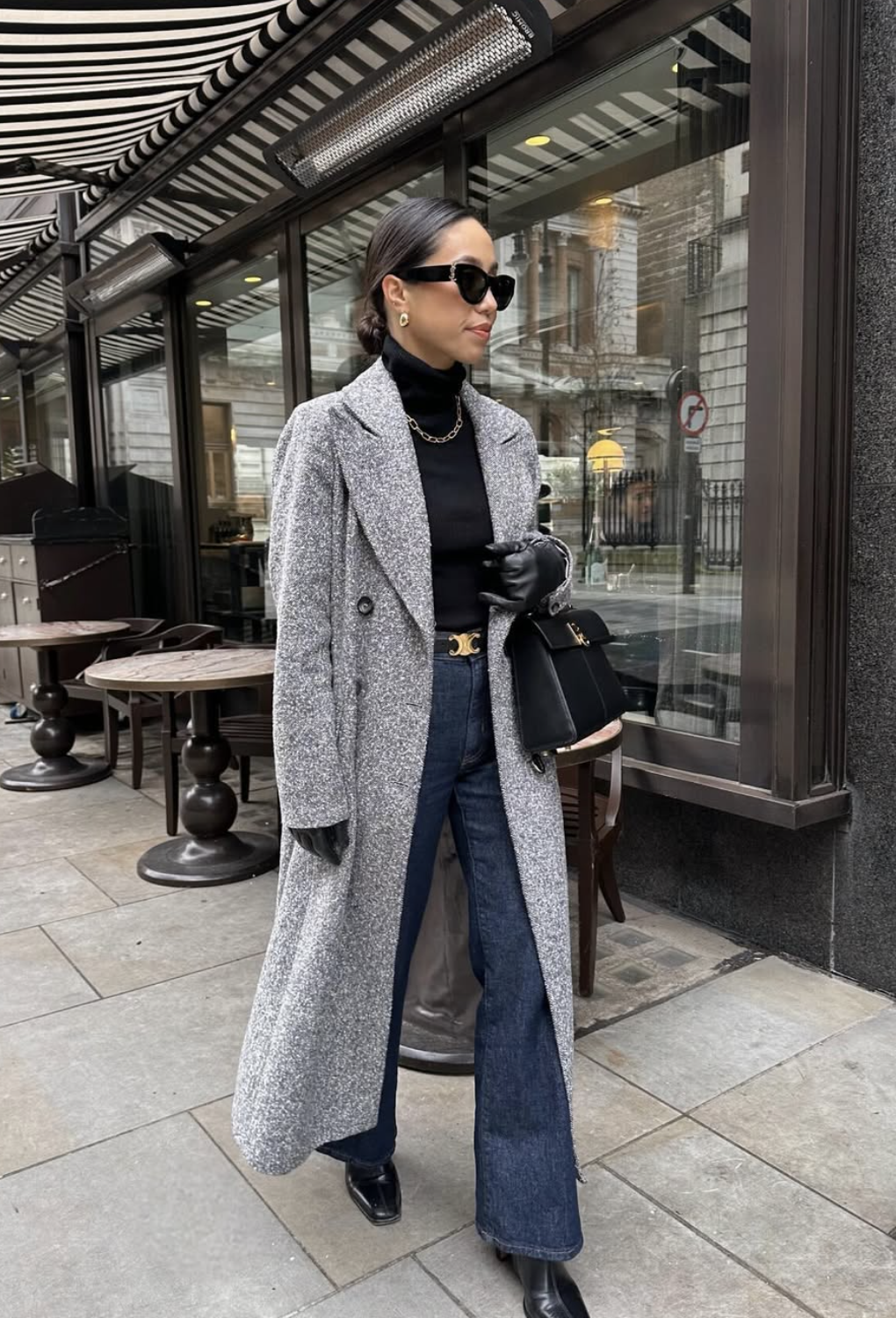 Full-length dark jeans going out top boots outfit showing the complete boot shaft and shoes
