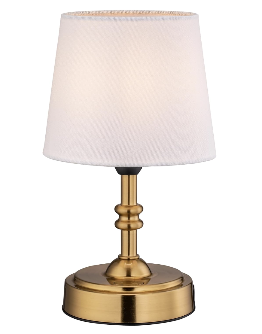 Cozy room lit by small warm table lamps